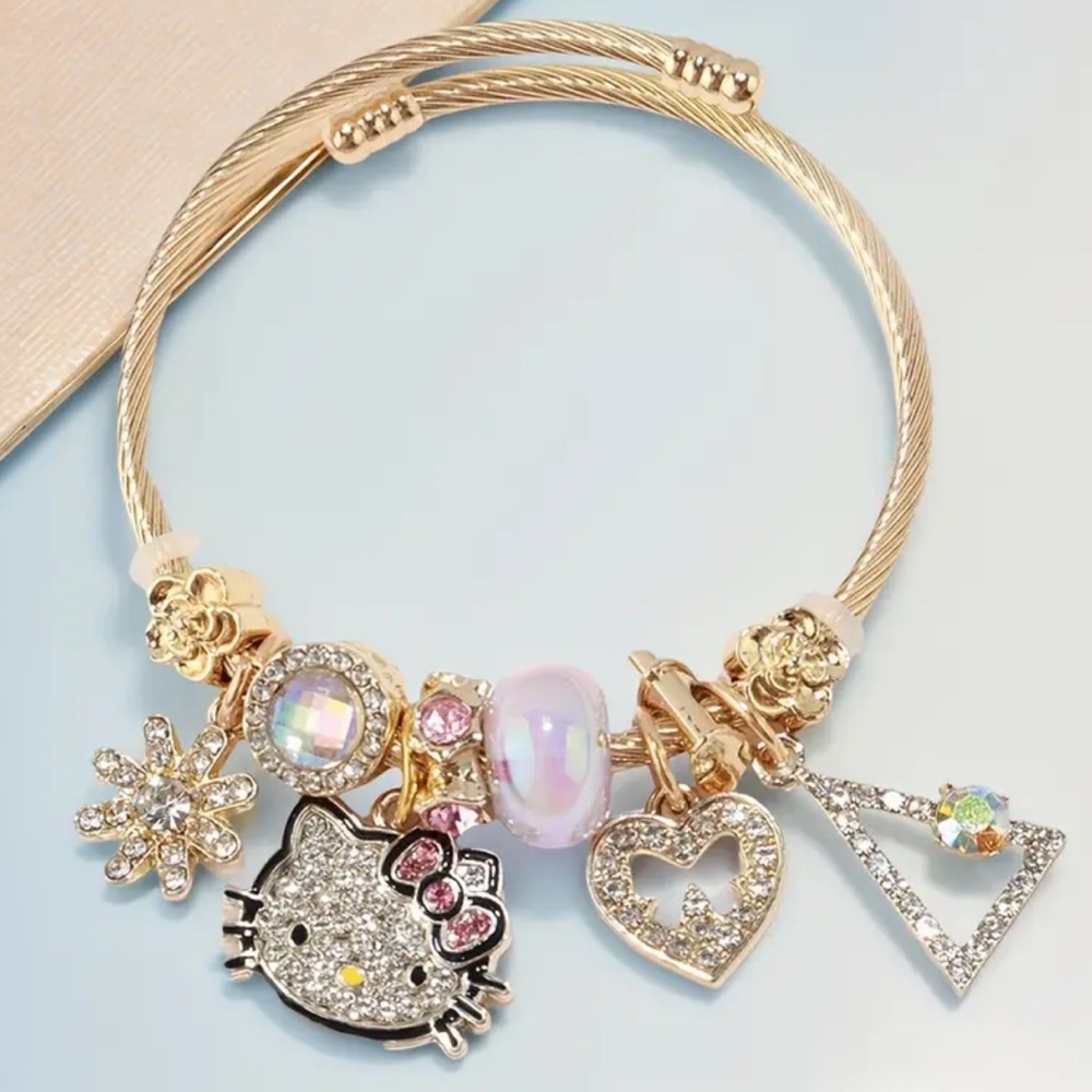 Gold Hello Kitty Charm Bracelet. New.